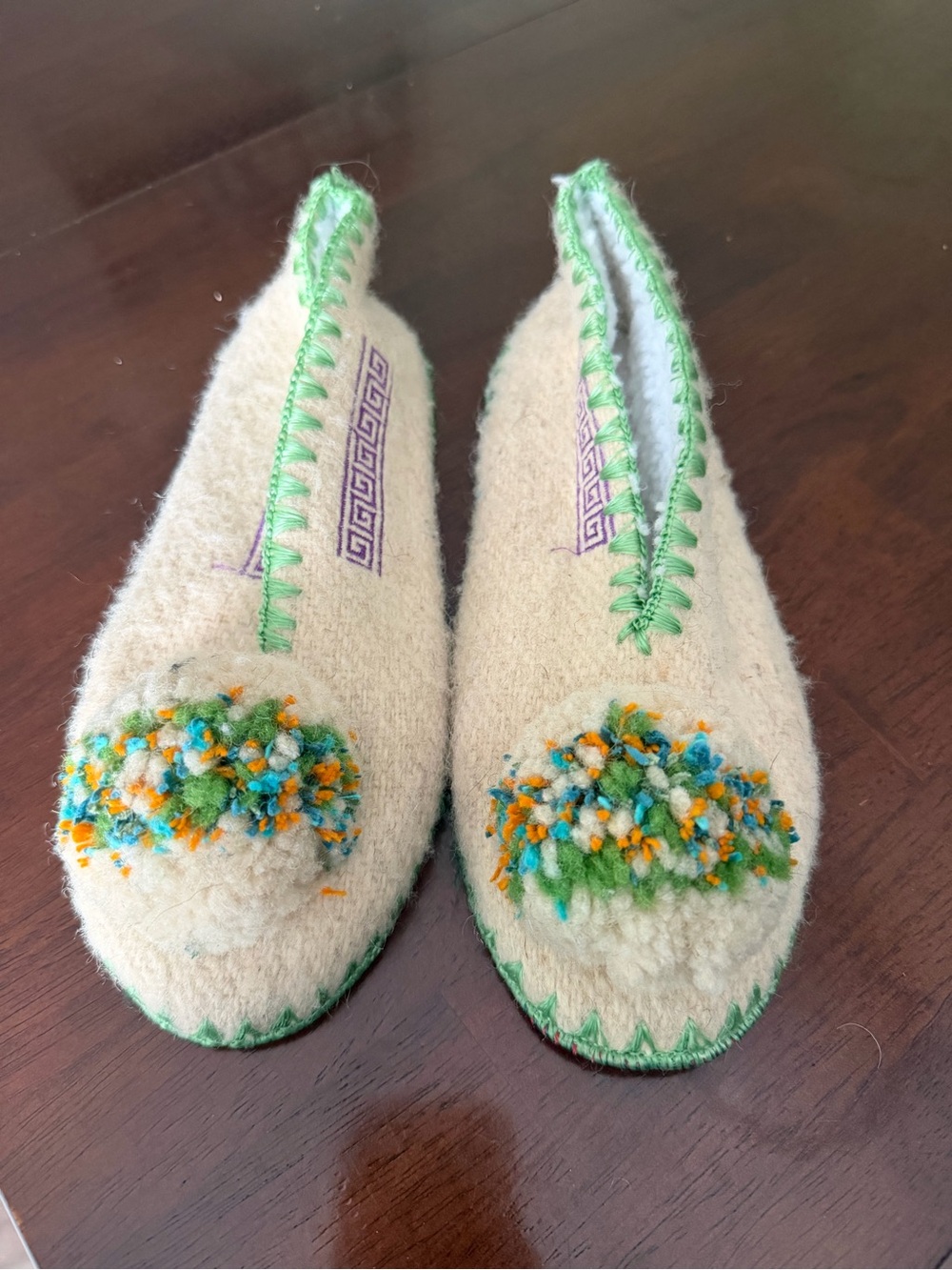 Cream Wool Slip-On Slippers with Green Trim and Multicolor Pom Accents